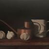 Watering can with garlic - still life