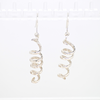 Spiral earrings with hammered lines texture