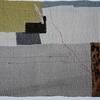 Densely stitched textile collage suggesting vast empty landscape found during travels in New Mexico