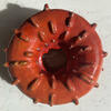 Orange 3D glazed doughnut shaped sculptural objecte