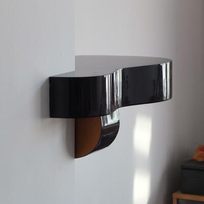 Chimney breast shelf made from a guitar. 