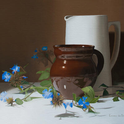Realist still life oil painting 'Little blue flowers' by artist Emma de Souza with a white jug, a brown jug and little blue flowers ceratostigma griffithii