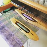 Weaving silk and wool on a traditional table loom
