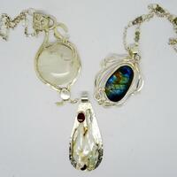 Sterling silver pendants. Moonstone, Labradorite, Large residual pearl with garnets.