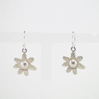 Daisy earrings with floral texture