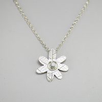 Daisy pendant with floral texture, Sterling silver