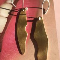 Gold lips earrings from lipreading studies by Teague