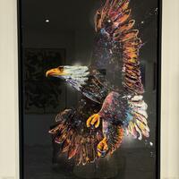 36 x 24 inch acrylic painting of a vibrant eagle energetically taking flight,  with black background and shiny resin finish