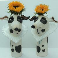 Large ceramic stoneware hound vases with Elizabethan collars. 23cm tall. £130each.