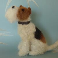 "Is it dinner time yet?"  Wire Fox Terrier needlefelted with Shetland, Merino and Wensleydale wools.