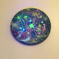 Round canvas, multimedia with glow-in-the-dark paint, 'Planet Earth'