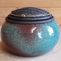 Raku pot with textured lid