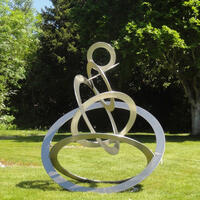 Sky Circles by Diane Maclean Stainless steel: all circles cut from a single sheet. Exhibited Salisbury cathedral 2019.  Collection of Queenswood School 2020