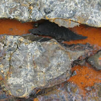 Detail x original photo of a rusty pipe at Newlyn - direct source of inspiration for Rust 3 tapestry.