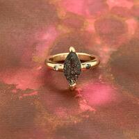 tourmalated quartz marquise gold ring with black and white diamond flush set into the shank