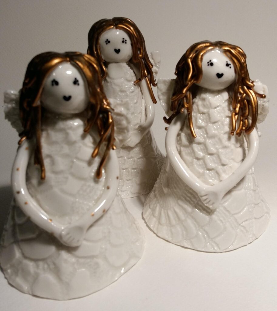 Christmas angels made from porcelain clay.