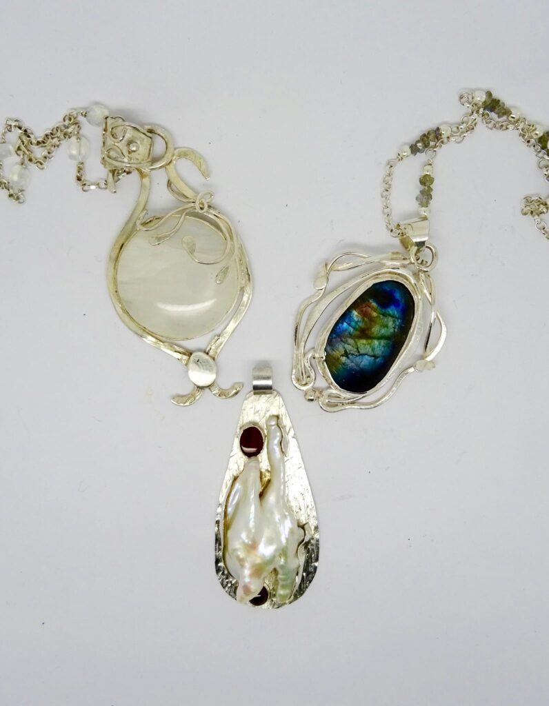 Sterling silver pendants. Moonstone, Labradorite, Large residual pearl with garnets.