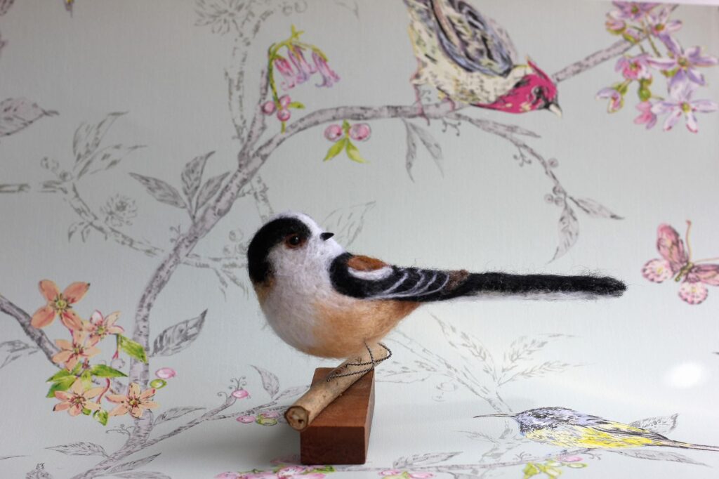 Long Tailed Tit - needlefelted sculpture mounted on a wood base