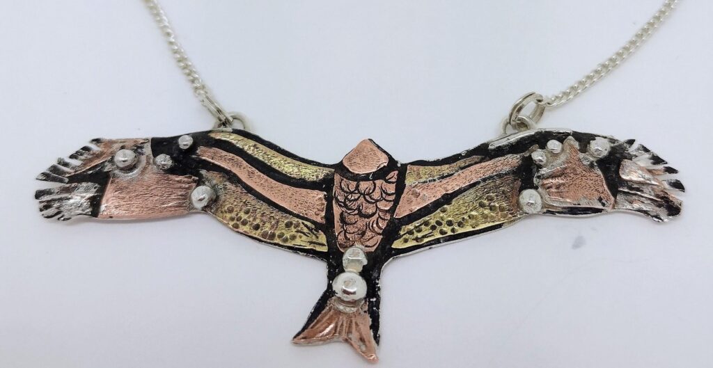 Red kite pendant. Mixed metals.