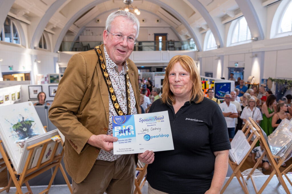 Judy Century wins the Pearldrop Award