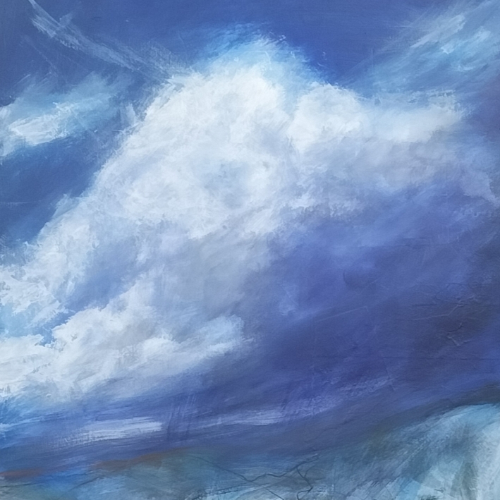 A landscape with a cloudy sky