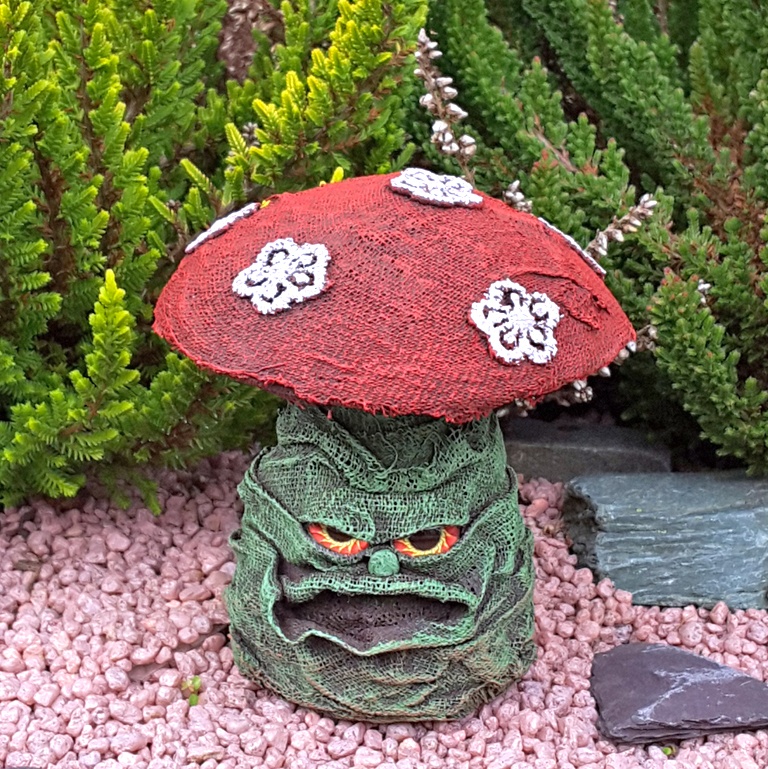 Grumpy, red and green mushroom made of fabrics