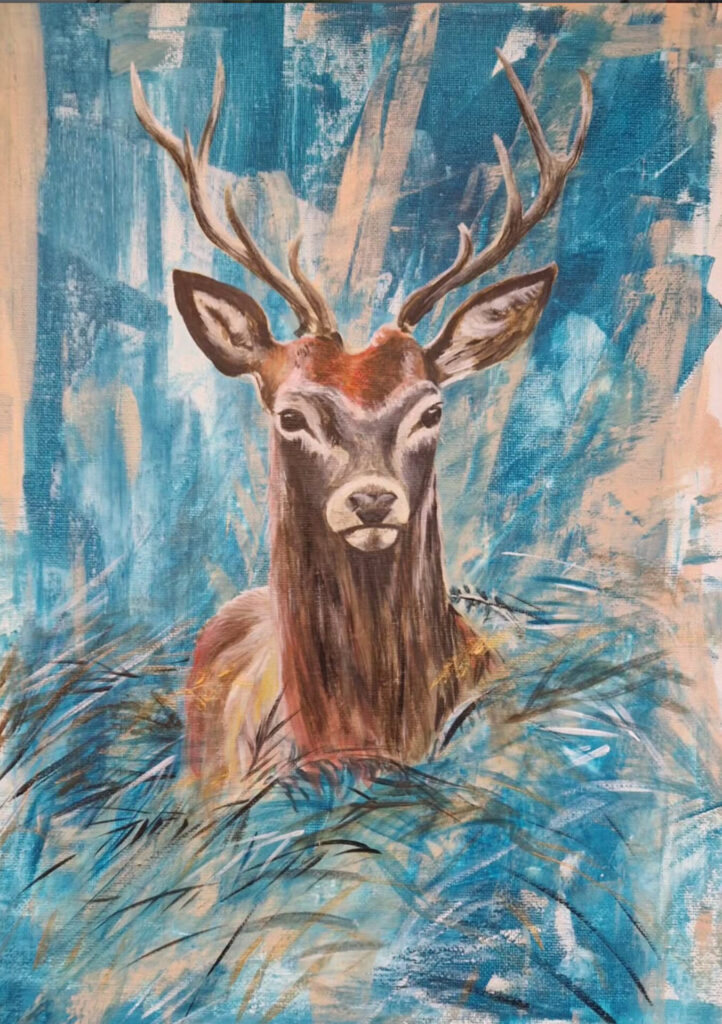 Stag in blue grass