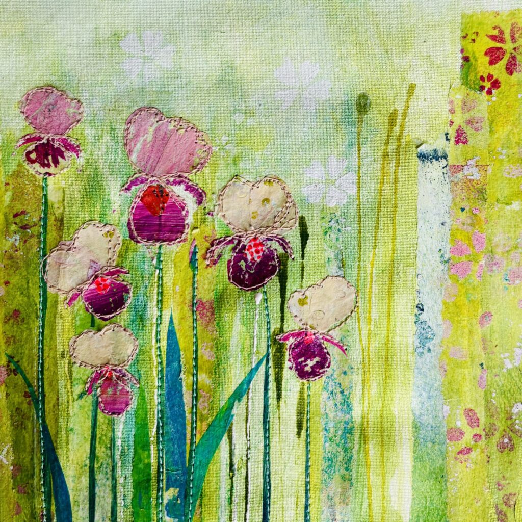 Iris. A nature-inspired collage of  handprinted paper, threaded through with a line of stitch. Original works alongside prints, cards, and textile pieces available.