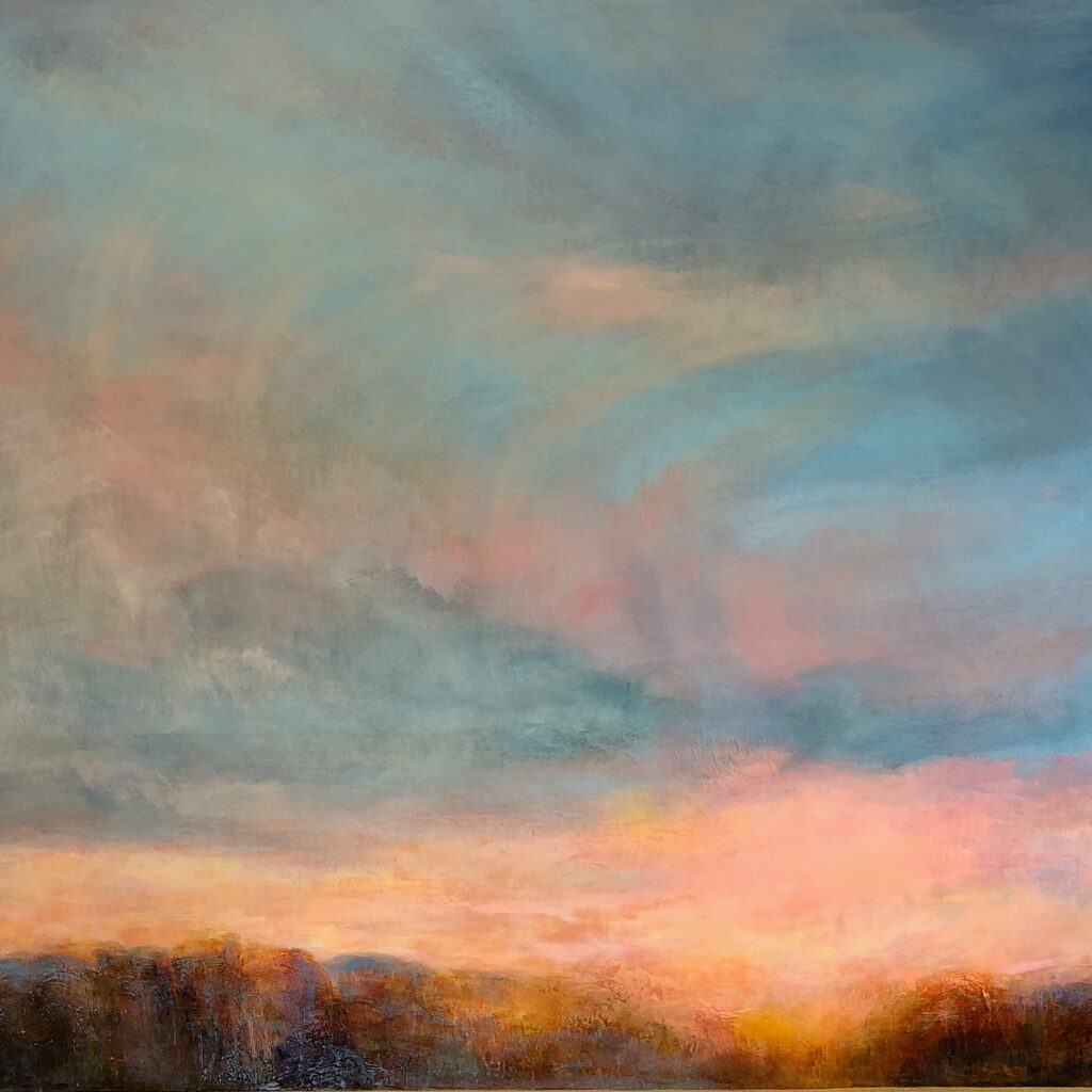 A square crop taken from an abstract landscape painting in soft, blended colours. Most of the image is filled with a wide sky of pale blue, grey and muted turquoise, layered with sweeping brushstrokes and hints of pink. Along the bottom edge, a dark low horizon suggests distant trees or hills. Warm peach, orange and golden tones glow near the horizon like sunrise light breaking through clouds. The overall mood is calm, atmospheric and dreamlike.